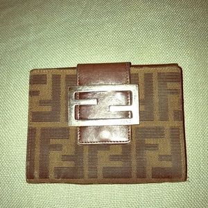 Authentic FENDI preowned wallet w/ button closure